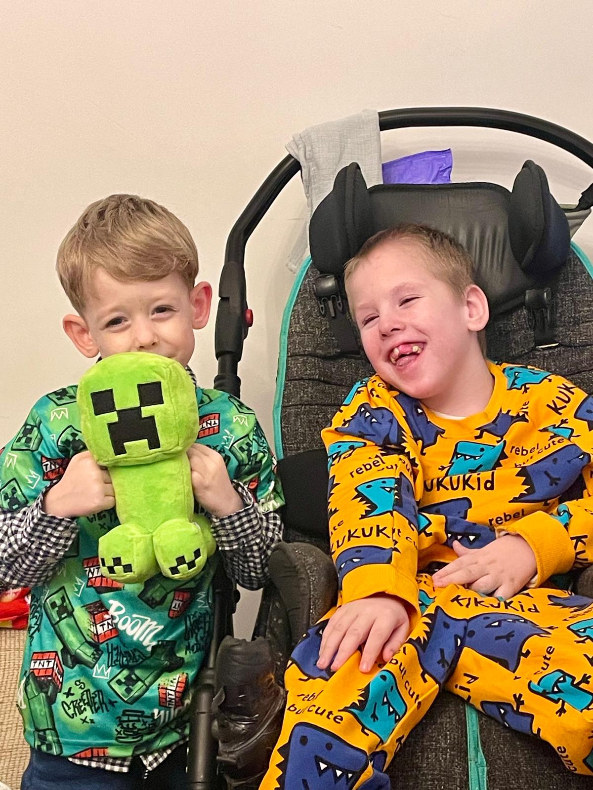 Joshua and Xavier sharing a joyful moment together